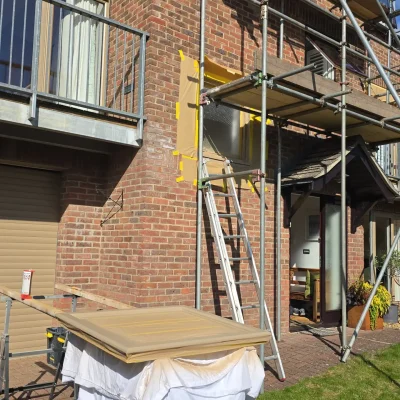 Scaffolded-Exterior-Spray-Works